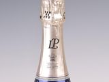 a bottle of champagne that is sitting on a table