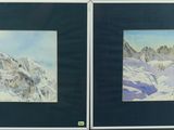 lot de deux tableaux encadrés représentant un paysage de montagne enneigé