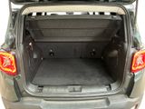 the back of a car with its trunk open showing the cargo area