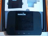 a box with a radiolink on top of it on a table