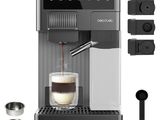 a close up of a coffee machine with a cup of coffee
