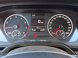 a close up of a car dashboard with a speedometer and gauges