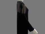 an image of a mannequin wearing a black dress with fringes