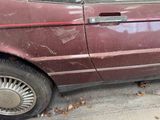 an image of a car that has been badly damaged