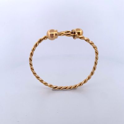 Bracelet jonc croisé et torsadé en or 18 carats 750 mil. - Photo 1