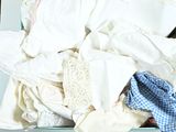 a box full of clothes that is sitting on a table
