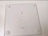 a picture of a white square plate on a table