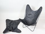a black chair and a black chair on a white background