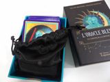a box with a tarot and a book in it