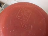 a red object sitting on top of a table