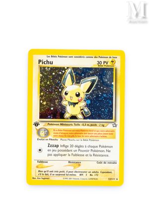 a close up of a pokemon card on a white surface