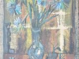 une peinture de fleurs dans un vase sur une table