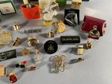 many different types of perfumes on the table