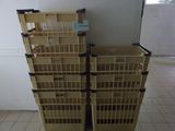 two crates stacked on top of each other on the floor