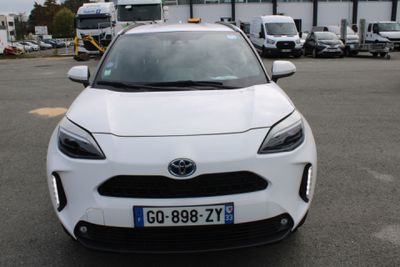 a white car that is parked in a parking lot