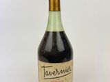 a bottle of wine that is sitting on a table
