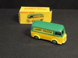 a toy bus that is sitting next to a box
