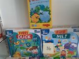 many children ' s board games on display in a store
