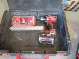 two tools in a tool box on the floor