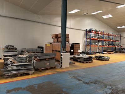 a large warehouse filled with lots of different types of equipment