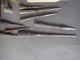 a lot of different tools that are laying out on the table