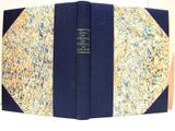 a blue book with a yellow and blue cover