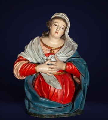 an image of a statue of a woman holding a baby