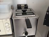a toaster and a microwave sitting on a kitchen counter