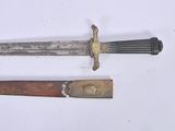 two different types of knives on a white surface