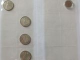 a lot of coins that are in a plastic bag
