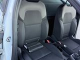 two seats in the back of a car that are empty