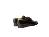 black leather shoes on a white background with a white background
