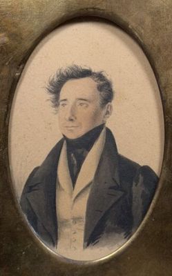portrait of a man in a suit and tie in a picture frame