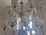 a chandelier with a lot of lamps hanging from it