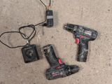 two tools that are laying on the ground together