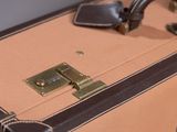 a close up of a piece of luggage on a table