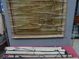 several pieces of wood are on a table in front of a window