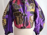 purple and black jacket on mannequin dummy on white background