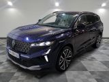 a dark blue suv parked on a checkered floor in a showroom