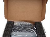 an open cardboard box with a pair of shoes inside of it