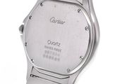 an image of a close up of a wrist watch on a white surface