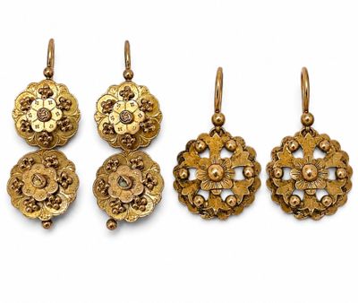 a set of five gold pendants and a pair of earrings