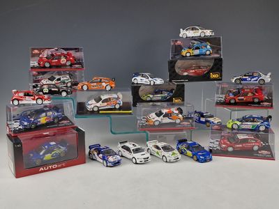 a lot of toy cars that are in a display case