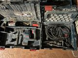a tool box with tools in it sitting on the floor