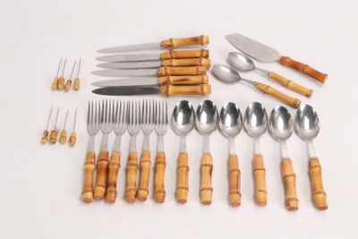 many different types of silverware and forks and spoons