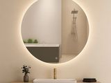 a bathroom with a sink and a mirror on the wall