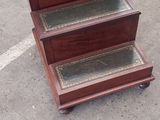three wooden steps that are sitting in the parking lot