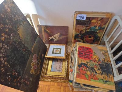 a lot of pictures and paintings on the floor