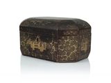 a small wooden box with a decorative design on it