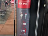 a close up of a gym equipment with a red sticker on it